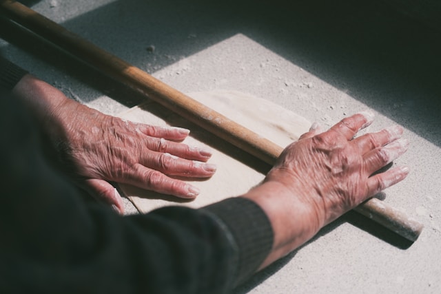 a local greek person showing up her hands