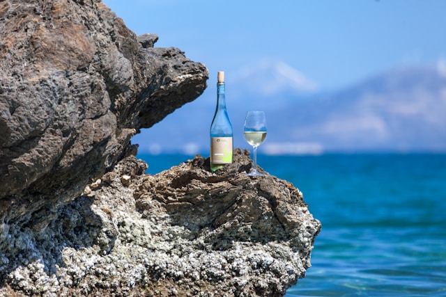 greek wine by the beach